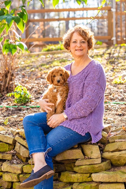 New franchise owner with Dog Training Elite - Cindy Skocik with her dog.